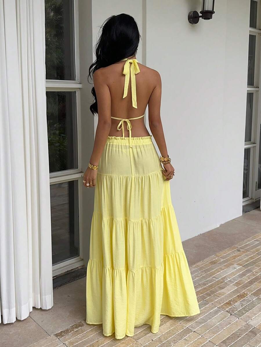 Exude Sun-Drenched Sophistication in Our Chic Yellow Linen 2-Piece Set!

Experience the breathtaking fusion of coastal heritage and sharp, modern architectural tailoring. This stunning yellow linen ensemble is meticulously designed for the woman who values a high-fashion, "quiet luxury" approach to resort wear—the ultimate centerpiece for prestigious beachside brunches, exclusive tropical retreats, and high-authority summer social gatherings.

Iconic Halter Artistry: Featuring a masterfully curated deep V-n