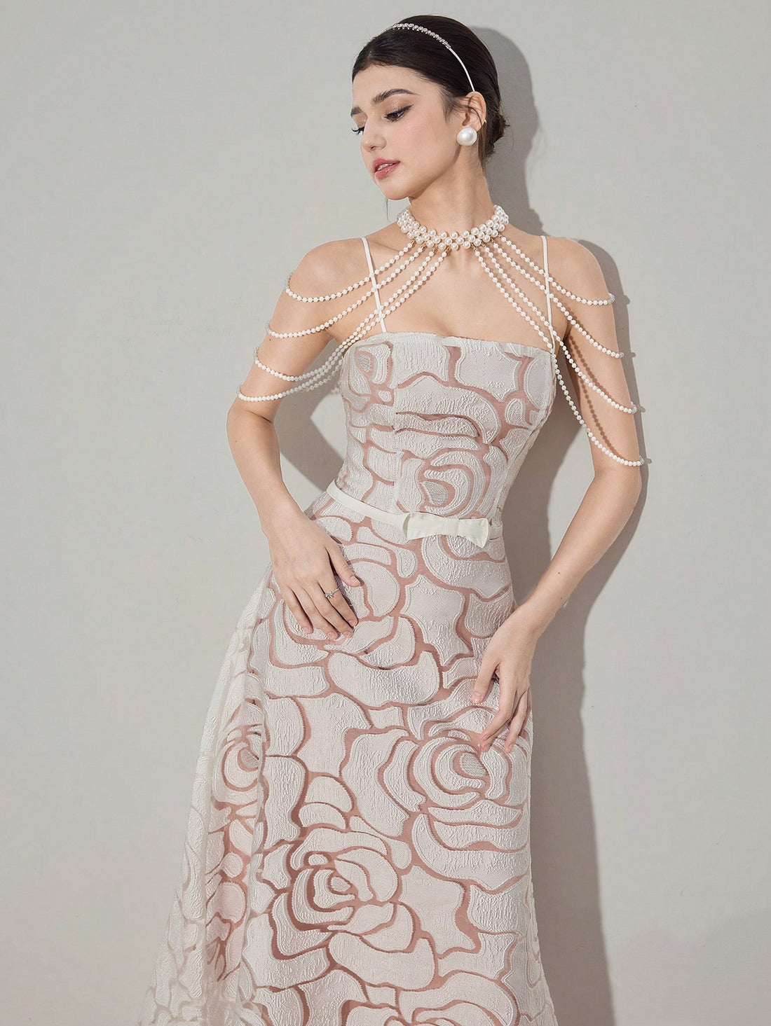 Step into sunshine with this playful mid-length dress crafted from soft jacquard knit. Its delicate spaghetti straps and elegant silhouette make it perfect for summer days and breezy evenings. Light, comfortable, and effortlessly chic, this dress adds a flirty touch to your warm-weather wardrobe.