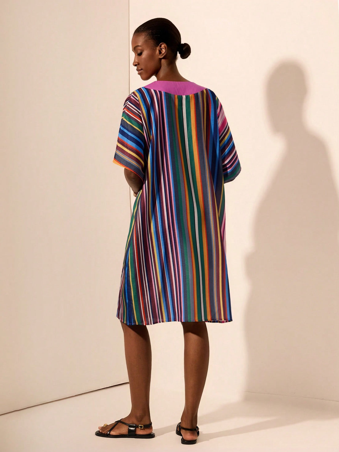 Step into summer with the Contemporary Boho Mini, featuring an oversized V-neck and bold striped colorblock design. Its wide sleeves add a breezy, playful vibe perfect for sunny days and spontaneous adventures. This unique piece blends comfort and style effortlessly, making it your go-to for standout summer fashion.