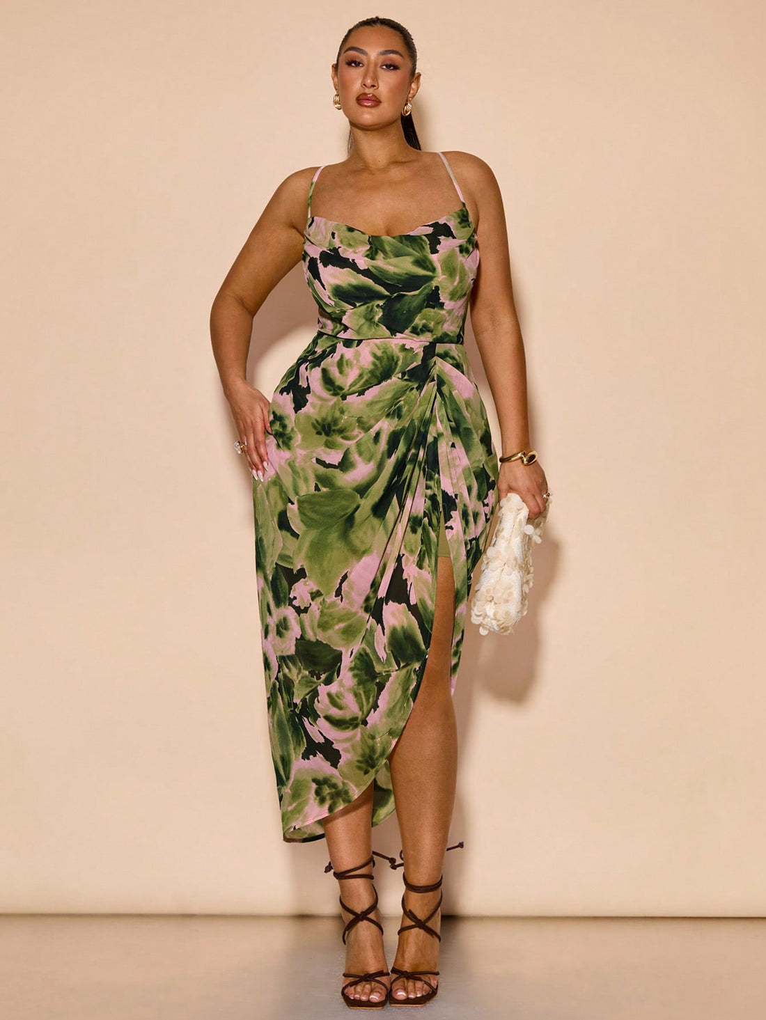 Step into style and comfort with this Elegant Plus Size V-Neck Tie-Dye Floral Dress. Its vibrant tie-dye pattern and flattering V-neck design make it a standout choice for parties, weddings, or casual outings. Designed to celebrate curves, this dress combines playful charm with effortless elegance, ensuring you feel confident and fabulous wherever you go.