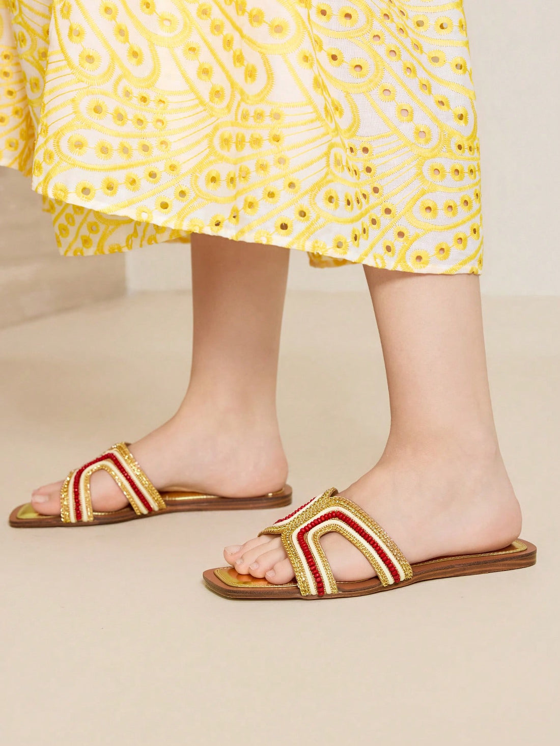 Step into sunshine and sparkle with these Elegant Gold Color Holiday Flat Sandals for Women. Perfect for adding a touch of glam to your casual looks, their shimmering gold finish pairs effortlessly with any outfit. Lightweight and comfy, they keep your feet happy while you dance through your holiday adventures. Shine bright and stay playful wherever you go!