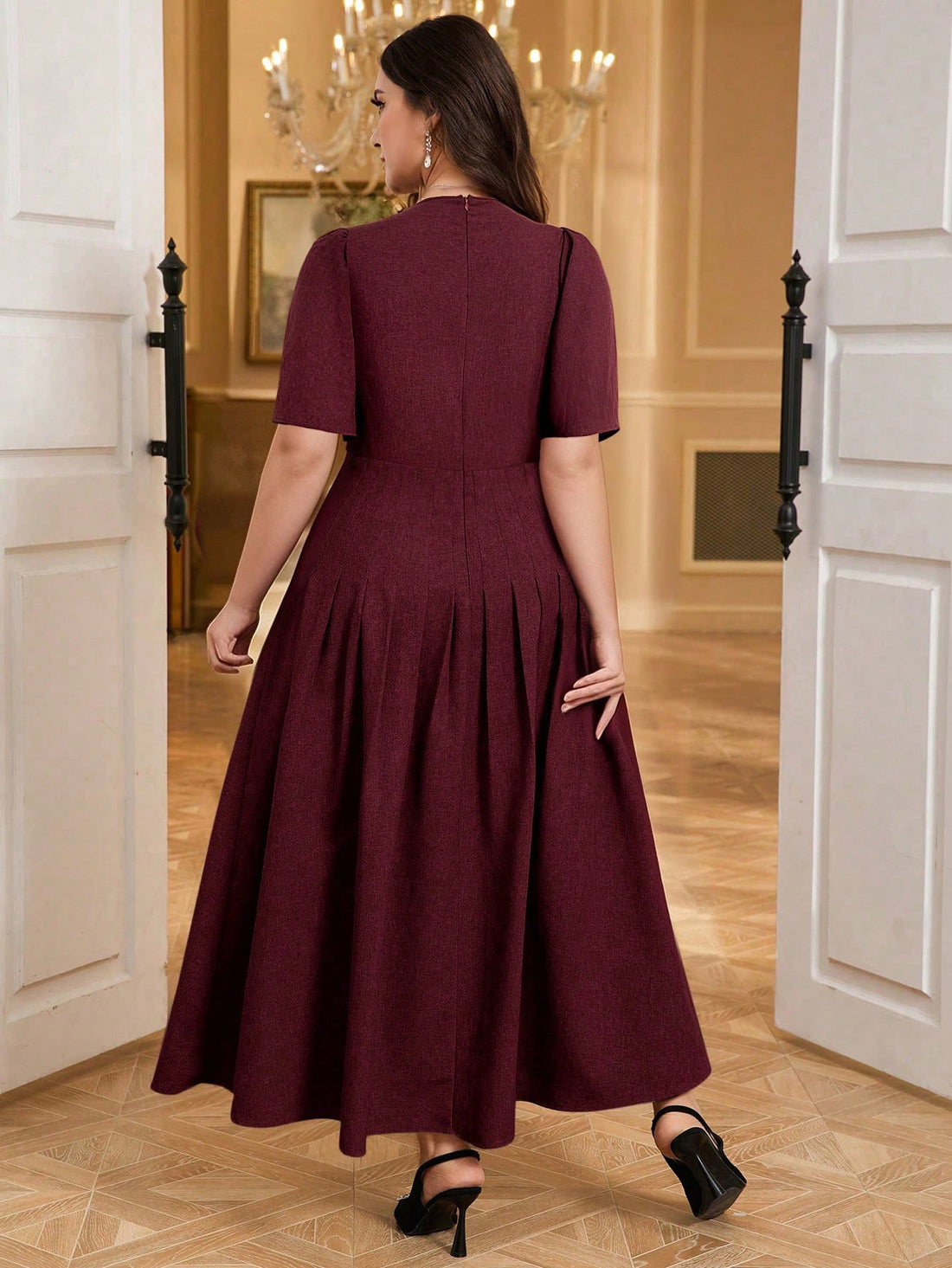 Elevate your wardrobe with this stunning plus-size dress that's equal parts sophisticated and fun! The notched neckline adds a modern twist, while delicate pleating creates beautiful movement and dimension. Crafted in a versatile solid color, this timeless piece transitions effortlessly from brunch to dinner, making it the go-to dress for any occasion. Designed to flatter and celebrate your curves, it's the kind of dress that makes you feel absolutely fabulous. Perfect for anyone who refuses to compromise o