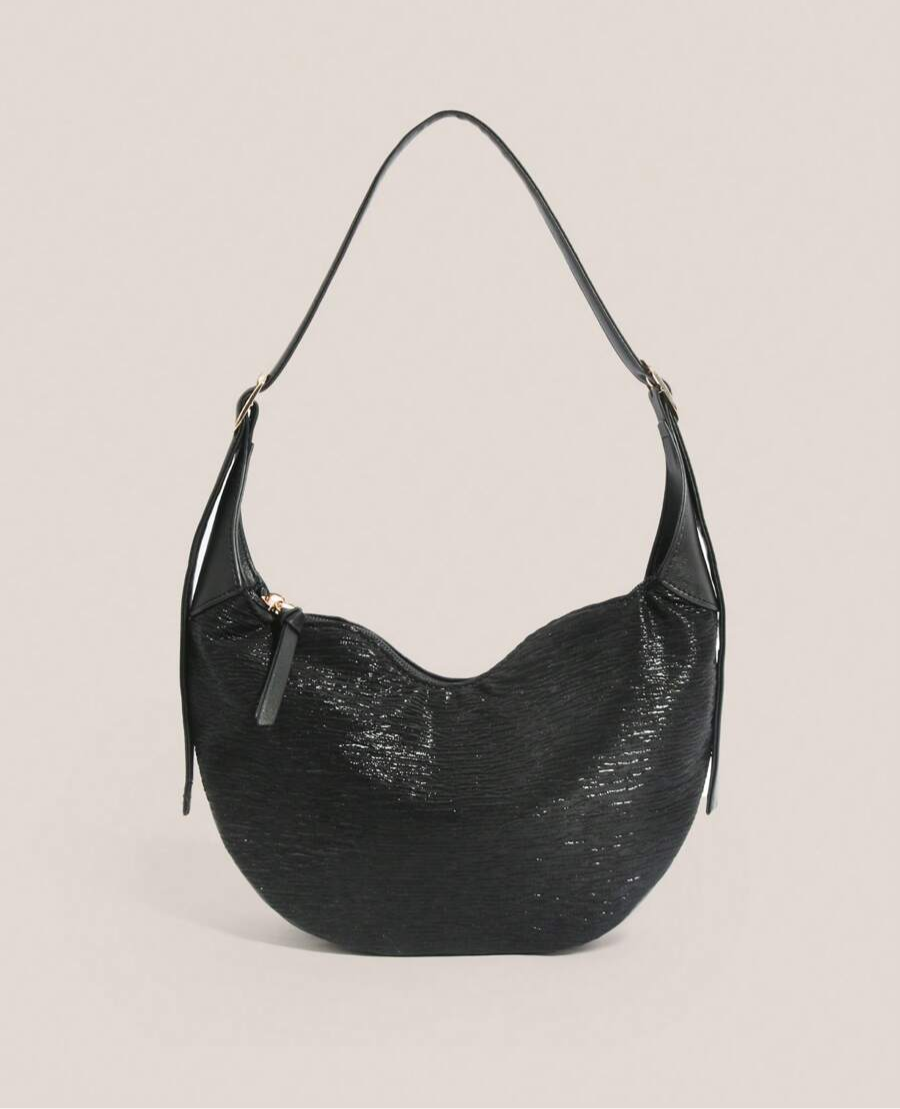 Carry your essentials in style with the Chic Handmade Bologna Patchwork Tote Bag! This crescent-shaped beauty boasts a spacious interior perfect for work, shopping, or your next adventure. Its unique patchwork design adds a playful touch to any outfit, while the roomy capacity keeps everything organized on the go. Whether you're commuting or exploring, this tote is your new favorite companion for a chic, hands-free day out.