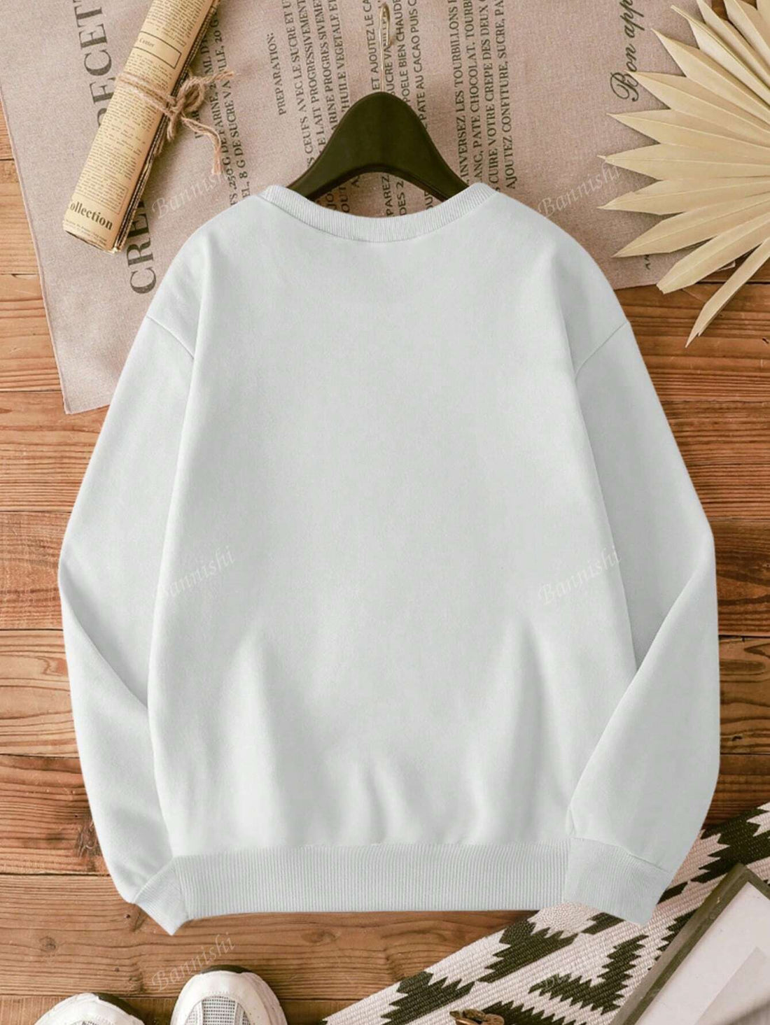 Experience unmatched comfort and effortless style with this women's crew neck sweatshirt featuring a relaxed drop shoulder design. Crafted for a cozy fit, it offers ease of movement while maintaining a modern silhouette. Ideal for layering or wearing on its own, this sweatshirt blends casual elegance with everyday practicality. Perfect for those seeking both comfort and a contemporary look in their wardrobe.