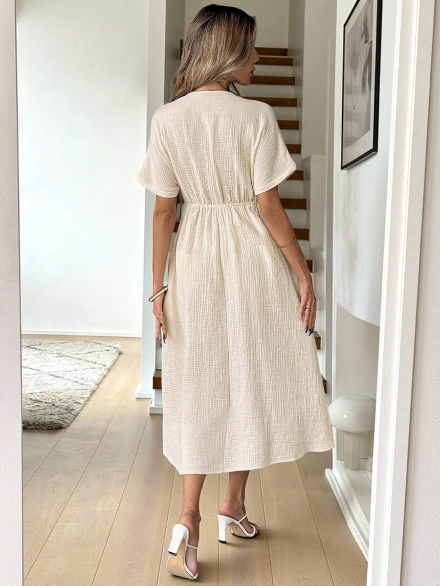 Elevate your everyday wardrobe with this charming apricot dress that strikes the perfect balance between effortless and elegant. The playful bow detail adds a touch of personality, while the relaxed short sleeves keep things breezy and comfortable. Cut to a flattering mid-length silhouette, it's your go-to piece for casual outings, weekend brunches, or laid-back dates. Pair it with sneakers for a fun vibe or dress it up with heels—this versatile number does it all with style and grace.