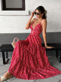 Red printed spaghetti strap cutout tiered maxi dress, seated front view