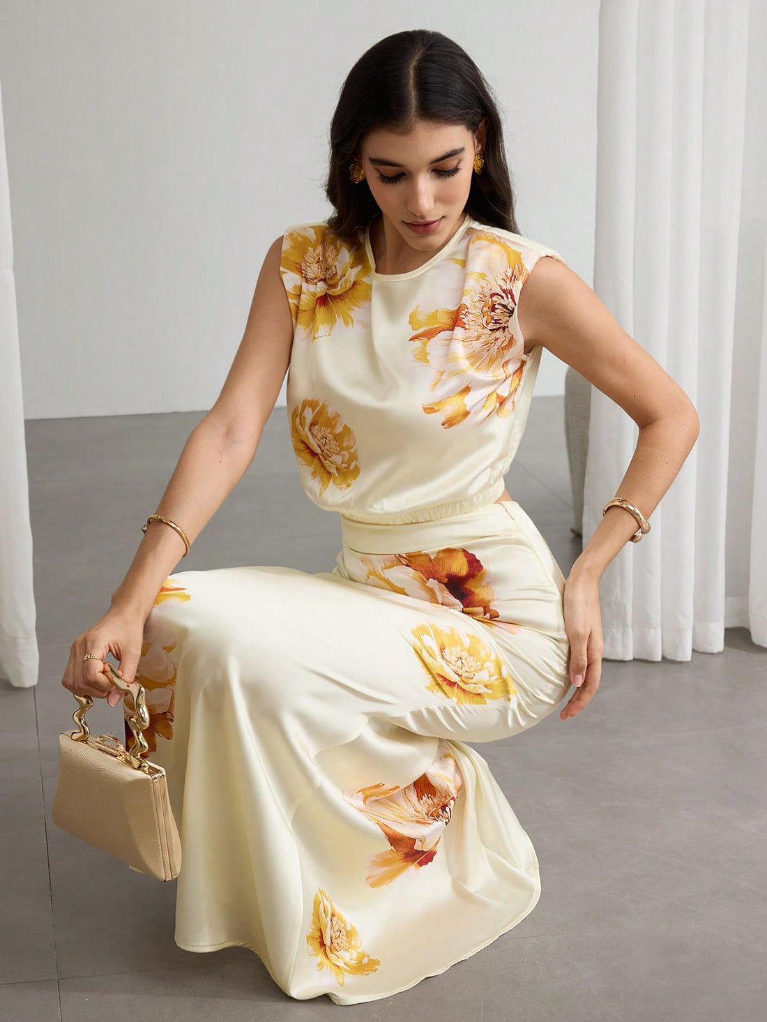 Bloom into summer style with this charming 2-piece set featuring a coordinated floral print vest and matching mini skirt. The lightweight vest layers beautifully over your favorite basics, while the flowy skirt keeps you cool and comfortable during warm days. Perfect for casual outings, garden parties, or weekend adventures, this set brings effortless elegance and a pop of botanical beauty to your wardrobe. Mix, match, or wear together—endless styling possibilities await!