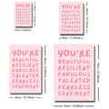 Pink resilience quote canvas styled as bedroom or office decor