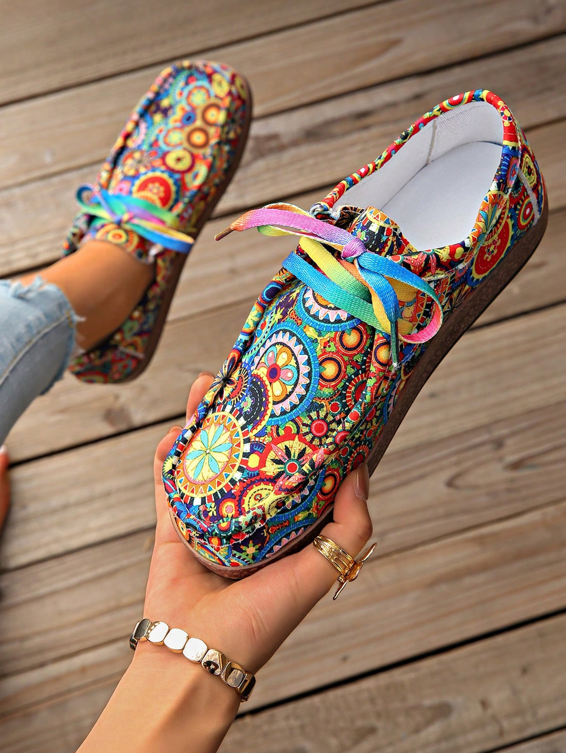 Step out in style with these playful plus size women's canvas shoes featuring a vibrant graffiti print. The lace-up design ensures a snug fit, while the flat sole offers all-day comfort for your casual adventures. Perfect for adding a splash of color and fun to any outfit!