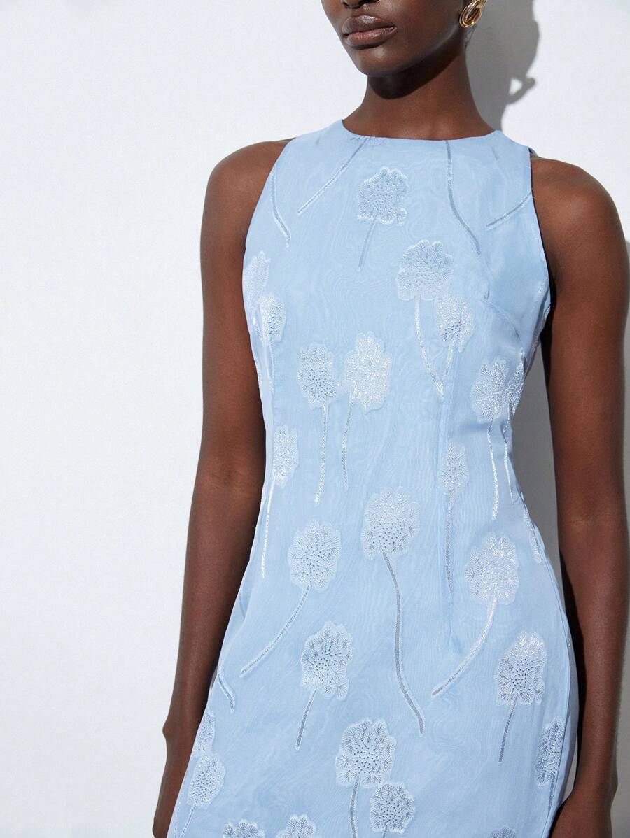 Step into your love story with this Elegant Floral Textured Long Sleeveless Wedding Dress, perfect for the romantic minimalist. Its delicate floral texture adds a whisper of charm without overwhelming your natural glow, while the sleek sleeveless design keeps things effortlessly chic. Flowing gracefully to the floor, it’s designed to move with you—because your day should feel as light and joyful as you do. Say yes to simplicity with a dash of romance!