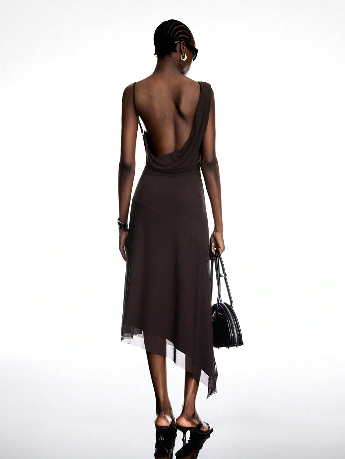 Step into summer with this Elegant Ruched Asymmetrical Backless Dress, designed to turn heads at birthdays and festivals alike. Its vintage-inspired flowy silhouette and playful ruching create a flattering, breezy look that keeps you cool and stylish. The daring backless design adds a touch of flirtiness, making every moment feel like a celebration. Perfect for dancing under the sun or lighting up the night, this dress is your go-to for effortless charm and fun vibes.