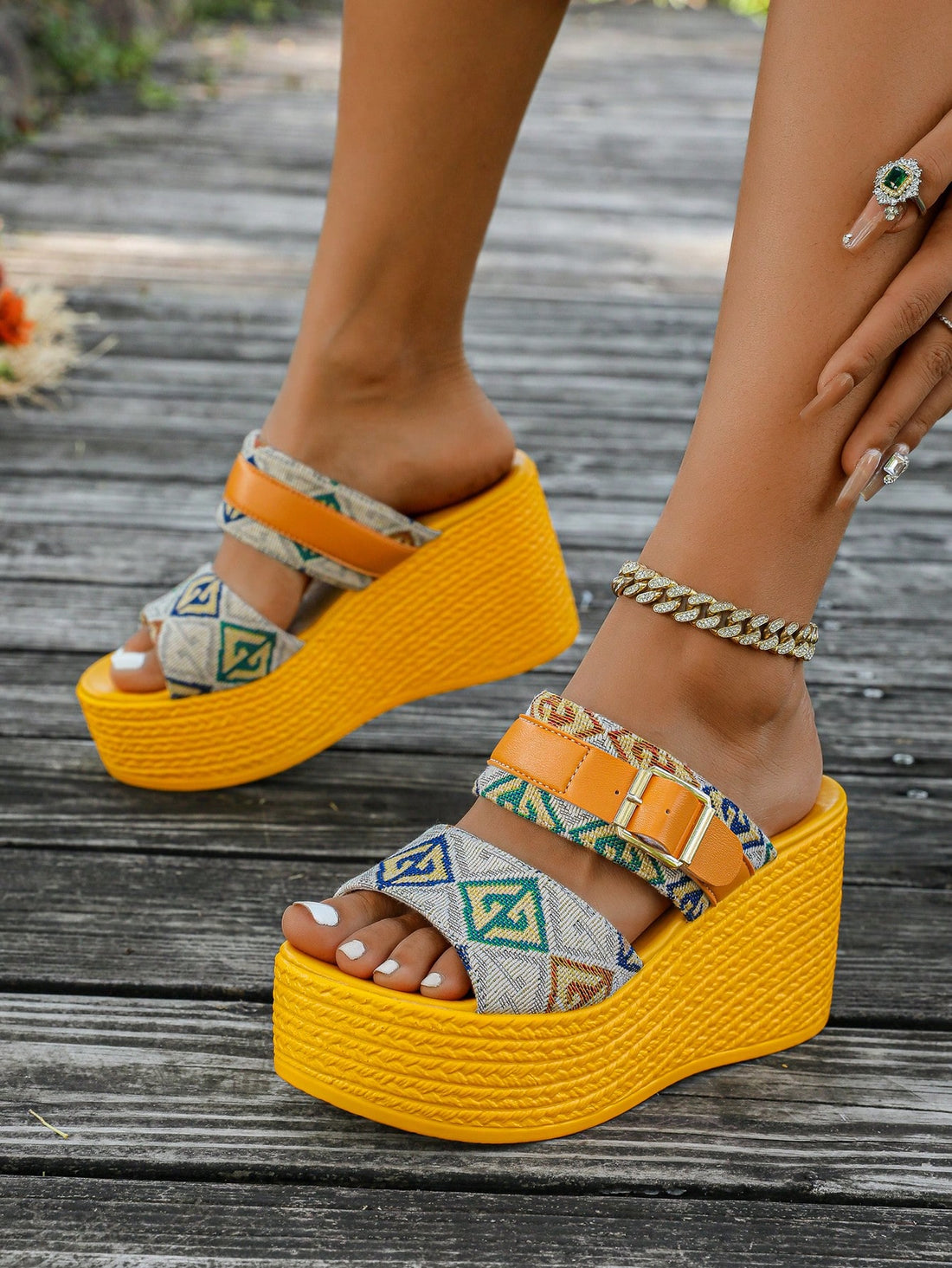 Step into sunshine with these shiny yellow platform sandals! Featuring an open toe and high wedge heel, they add a playful pop of color to any summer outfit. The non-slip sole keeps you steady while you dance or stroll, making them perfect for sunny days and warm nights. Bright, bold, and comfortable—these wedges are your go-to for fun in the sun.