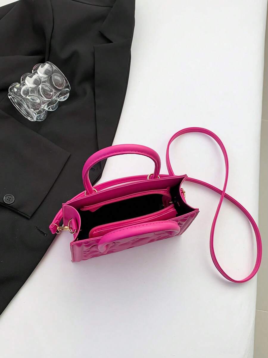 Elevate your style game with this chic and sophisticated women's crossbody handbag. Its sleek design pairs effortlessly with any outfit, while the compact size keeps your essentials close and your hands free. Perfect for day-to-night wear, this fashionable purse adds a playful touch of elegance wherever you go.