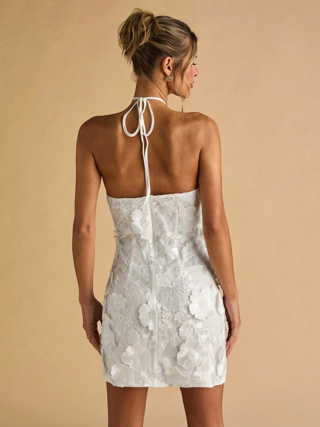 Step into sunshine with this playful summer mini dress, featuring delicate floral embroidery and a flirty halter neckline. Lightweight and breezy, it’s perfect for warm days and spontaneous adventures. Embrace effortless style and let your vibrant personality bloom wherever you go.