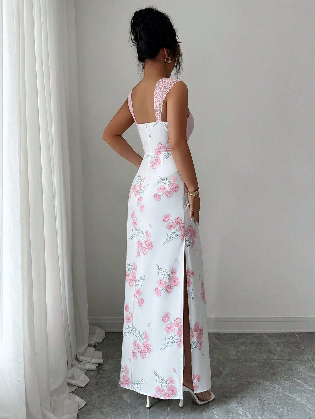 Twirl into the season in this stunning floral print spaghetti strap dress! Delicate blooms dance across the fabric, creating an effortlessly chic look that's perfect for holiday parties, festive gatherings, and special celebrations. The lightweight spaghetti straps offer a graceful, feminine silhouette while keeping you comfortable all evening long. Whether you're heading to a cocktail soirée or a casual holiday brunch, this versatile dress brings just the right amount of elegance and playful charm to any o