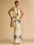Floral backless halter top and low-rise ruched maxi skirt resort outfit