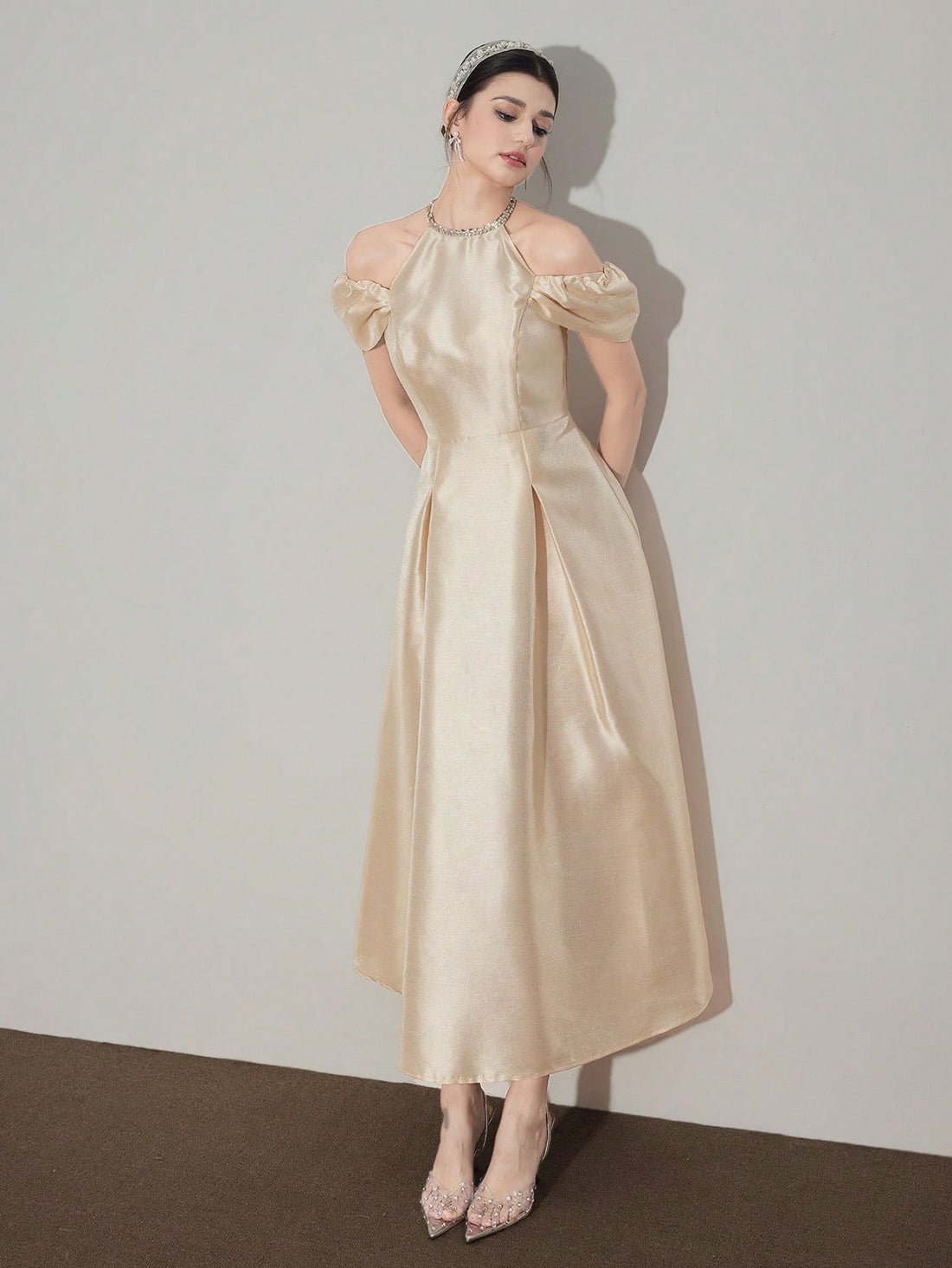 Slip into sophistication with this stunning A-line dress that's equal parts glamorous and fun. The off-shoulder sleeves create a flirty, romantic vibe while sparkling rhinestone embellishments catch the light with every move. Perfect for special occasions, date nights, or whenever you want to feel absolutely fabulous, this mid-length silhouette flatters every figure and pairs beautifully with heels or statement jewelry. Dress up or dress down—this versatile piece is your new go-to for turning heads.