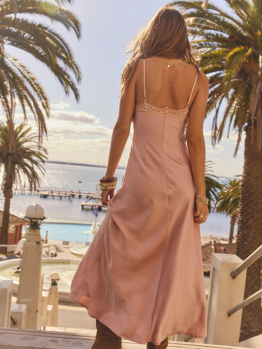 Step into the spotlight with this Elegant Lace Detail Maxi Dress, perfect for turning heads at winter soirées and summer celebrations alike. Delicately crafted lace adds a touch of romance, while the flowing maxi length ensures you move with grace and ease. Whether you're dancing at a party or making memories at graduation, this dress blends effortless style with playful charm for moments you'll never forget.