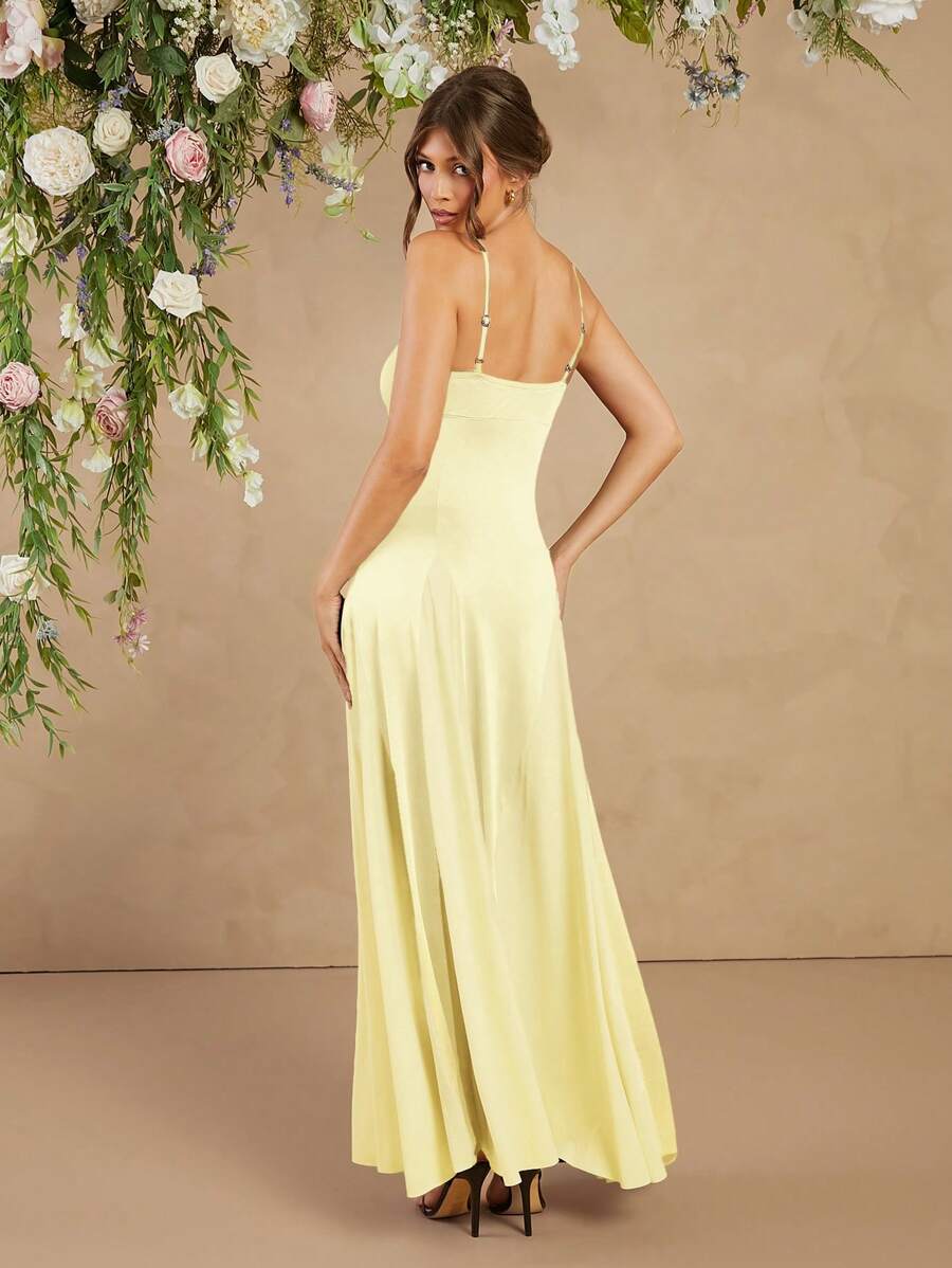 Step into summer celebrations with this elegant flowing maxi dress, designed just for wedding guests who want to shine! Featuring delicate spaghetti straps and a graceful silhouette, it offers breezy comfort while turning heads. Whether you're dancing under the stars or sipping champagne, this dress combines effortless style with flattering movement for your perfect sunny-day look.