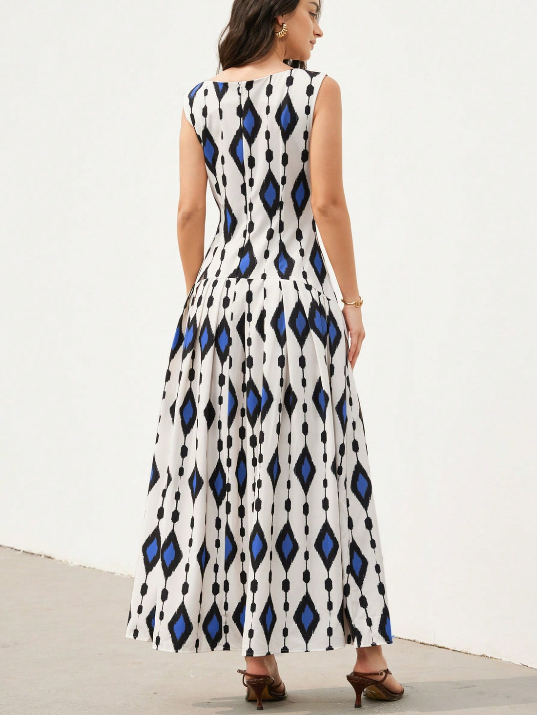 Step out in style with this playful sleeveless dress featuring a ruched waist that flatters your figure and a flounce hem that adds a fun, flirty touch. Perfect for chic commuting or casual outings, it combines elegance with effortless charm to keep you looking fabulous all day long.