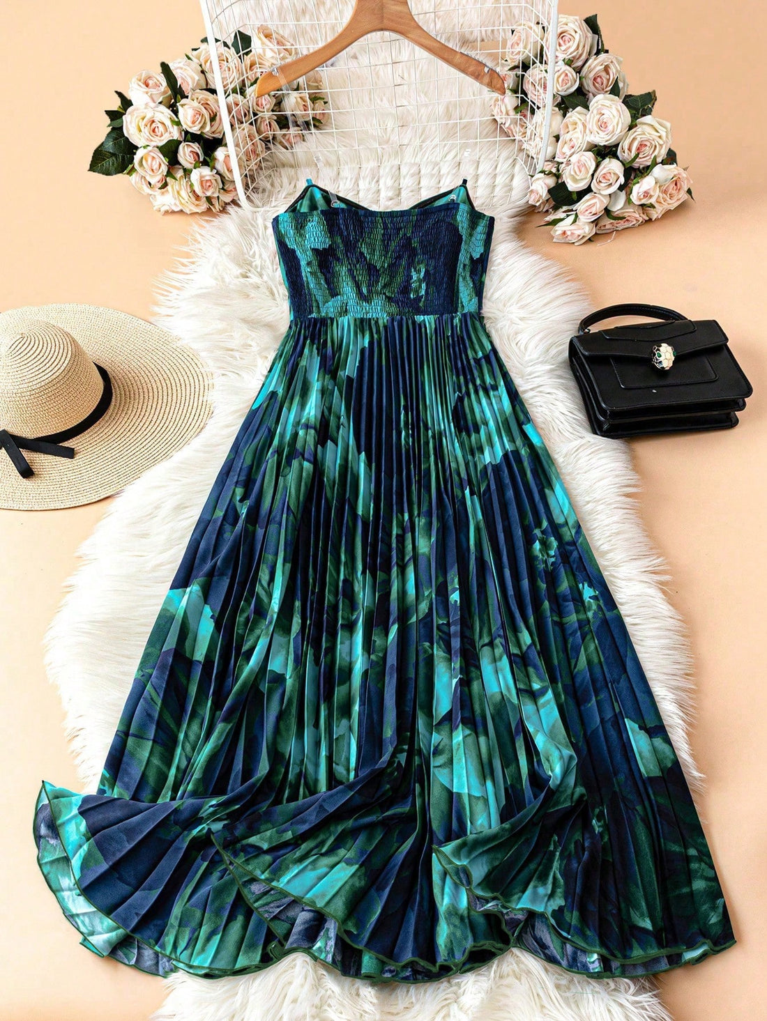 Turn heads at every high-end party with this elegant strapless pleated dress. The delicate transparent shoulder straps add a whimsical touch while keeping the look effortlessly chic. Flowing pleats create graceful movement, making you feel light and radiant all night long. Perfect for dancing, mingling, or stealing the spotlight with playful sophistication.