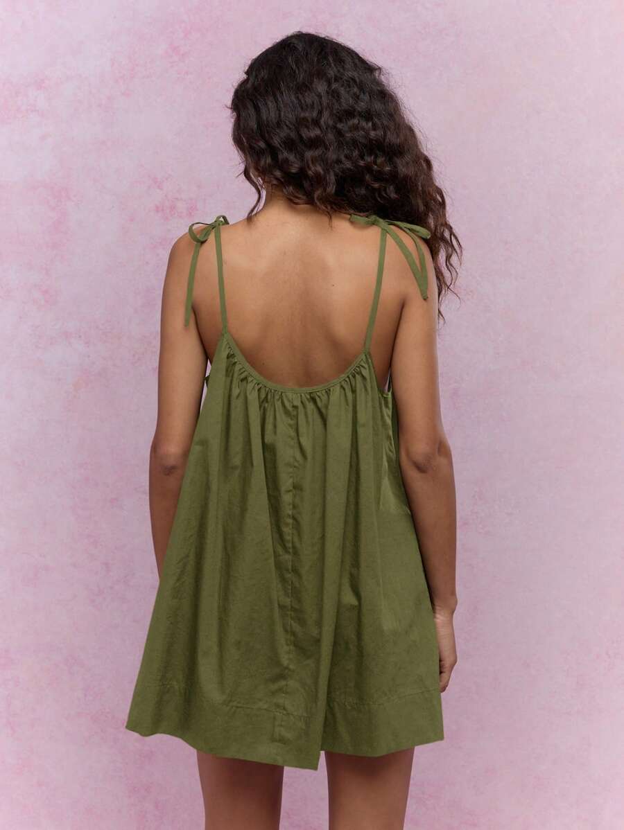 Enjoy sunny days in style with this Chic Summer Mini Smock Dress. Lightweight and breezy, its playful tie-shoulder design makes it an effortless beach cover-up or vacation staple. The smock silhouette offers comfort and a flattering fit, perfect for carefree moments by the sea or casual strolls. Embrace the warm weather with a fun, flirty dress that keeps you cool and confident wherever your travels take you.