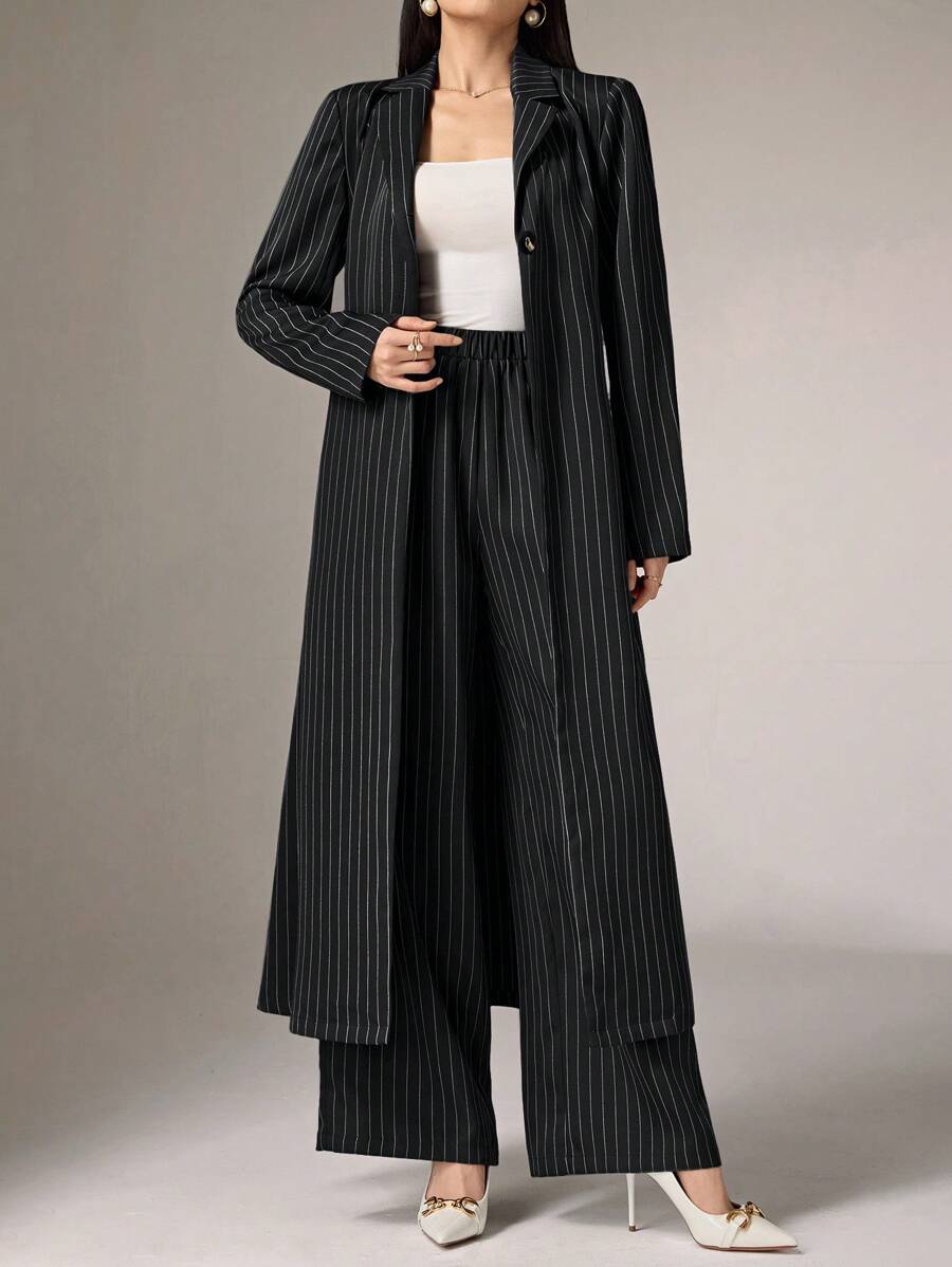 Elevate your fall wardrobe with this effortlessly chic striped two-piece set! The oversized long jacket pairs perfectly with tailored pants, creating a look that's equal parts cozy and put-together. Soft, breathable fabric keeps you comfortable through crisp autumn days, while the classic stripe pattern works with everything in your closet. Whether you're heading to brunch or the office, this versatile set proves that looking fabulous doesn't require any extra effort.