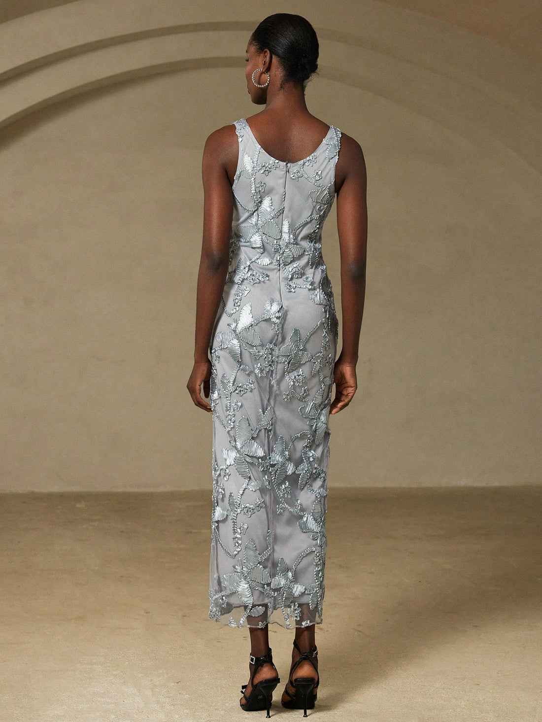 Step into the spotlight with this elegant party dress featuring charming 3D floral decor that adds a touch of whimsy to your look. Its sleeveless design and deep V-neck create a sophisticated silhouette perfect for dancing the night away. Whether it’s a gala or a celebration, this dress brings high-end style with a playful twist.