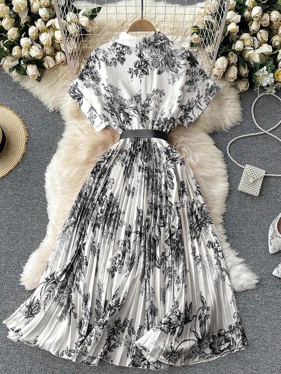Step into timeless charm with this plus size retro blue and white floral print midi dress. Its playful batwing sleeves add a breezy flair, while the classic floral pattern keeps you effortlessly chic. Perfect for twirling through sunny days or making a statement at your next gathering, this dress combines comfort with vintage style in the most delightful way.