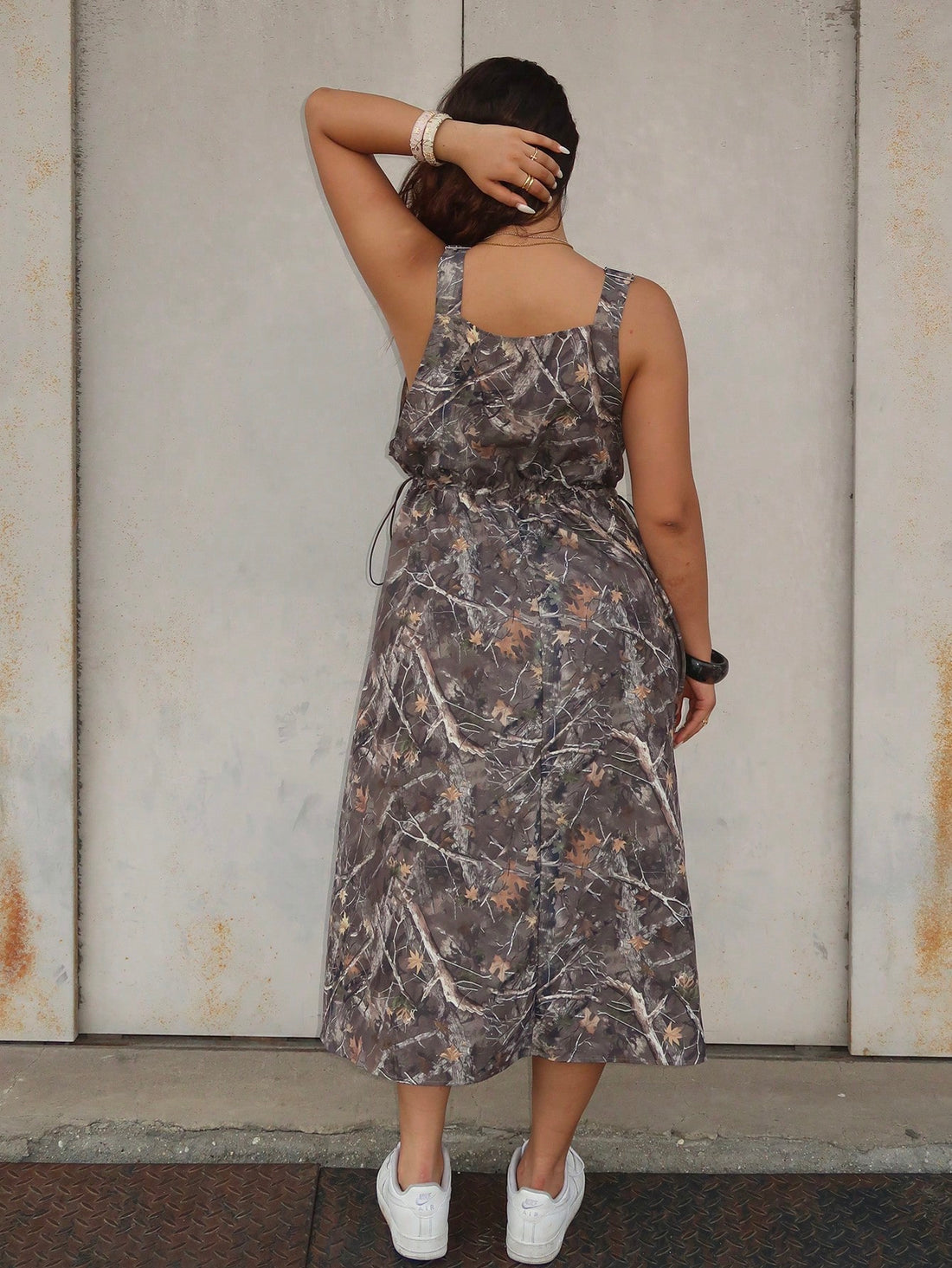 Make a statement this season in our plus-size camouflage print dress—the perfect blend of edgy style and effortless comfort. Whether you're jet-setting on vacation or grabbing coffee with friends, this versatile piece keeps you looking fabulous all day long. The relaxed fit flatters every curve while the bold camo pattern adds personality to your wardrobe. Pair it with sneakers for casual vibes or dress it up with accessories for a night out. Summer just got a whole lot more fun!