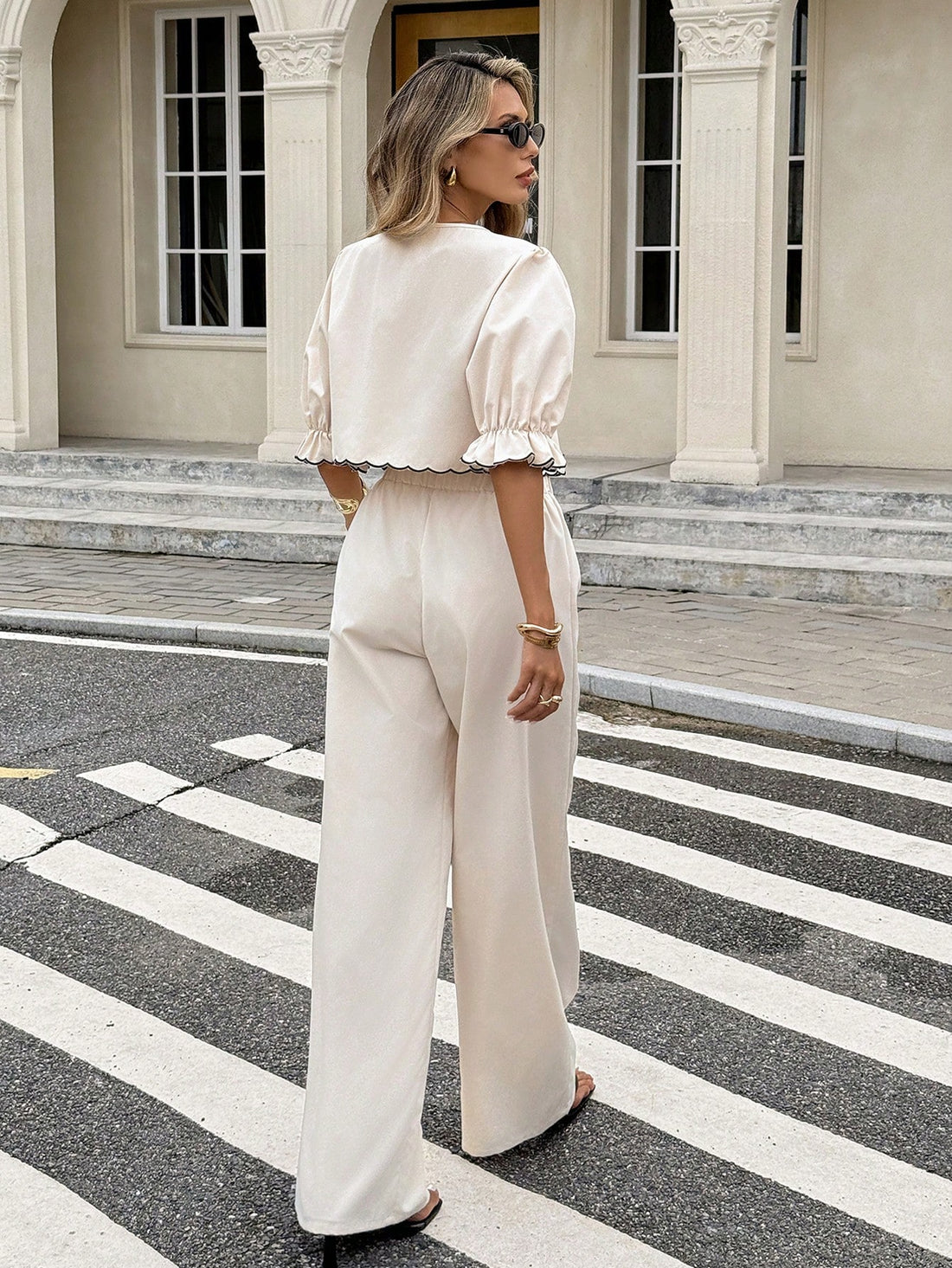 Elevate your wardrobe with this charming two-piece set that brings together style and comfort! The twist front top features delicate floral embroidery that adds a touch of elegance, while the coordinating pants complete the look with effortless sophistication. Perfect for brunch dates, casual outings, or whenever you want to feel put-together without trying too hard. Mix, match, or wear together—this versatile set is your new go-to for looking fabulous.