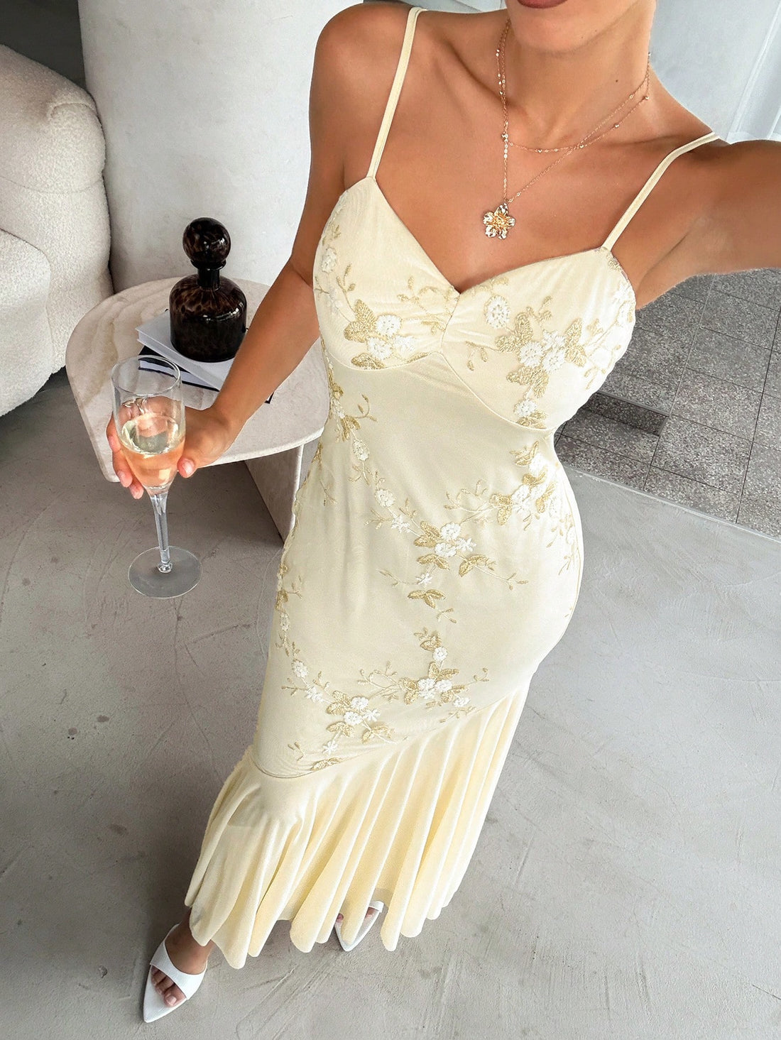 Step into sunshine with this Elegant Apricot Midi Dress, featuring delicate floral embroidery that adds a touch of whimsy. The spaghetti straps and bodycon fit highlight your silhouette while keeping things light and flirty. Perfect for garden parties or a playful day out, this dress brings effortless charm to your wardrobe.