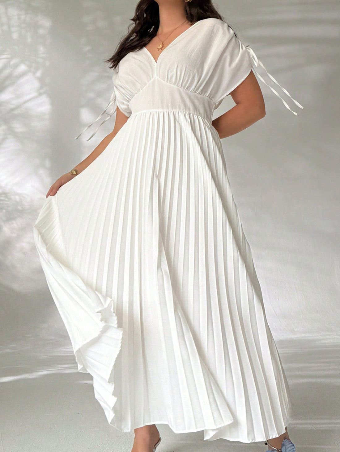 Step out in style with this Elegant Plus Size V-Neck Maxi Dress, designed to flatter your curves while keeping you cool and comfy. Its flowing silhouette and playful V-neckline make it the ultimate choice for summer parties, beach vacations, or any sunny celebration. Embrace effortless elegance and let the good vibes (and compliments) flow all season long!