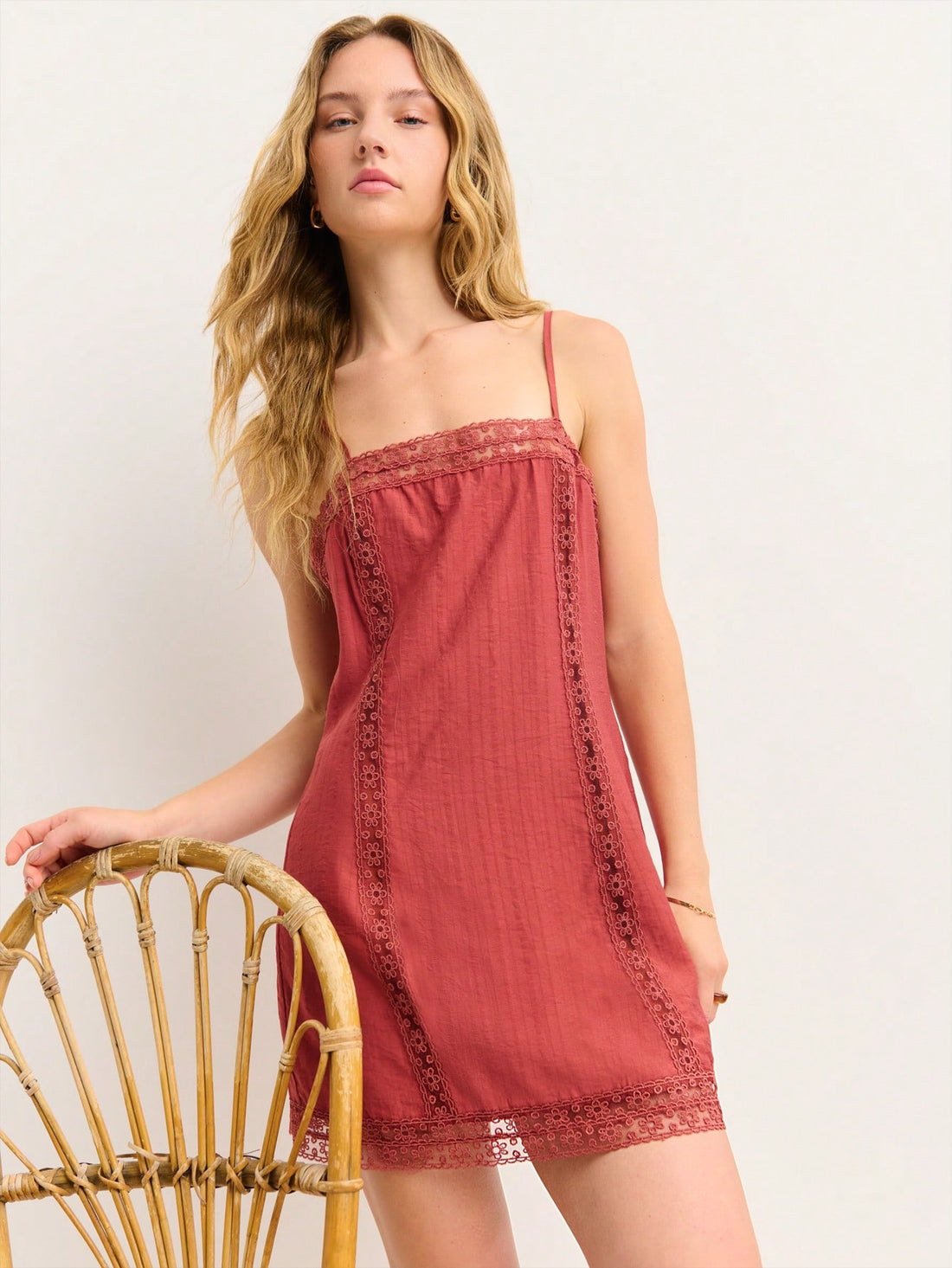 Slip into effortless elegance with this lightweight slip dress, designed to be your go-to piece for warm-weather adventures and festive celebrations. Delicate lace trim adds a touch of romance, while the slim straps keep things sleek and comfortable. Layer it over a tee for casual vibes or dress it up with heels and jewelry for those special occasions. Whether you're heading to a summer garden party or ringing in the holidays, this versatile beauty transitions seamlessly from day to night. Soft, breathable 