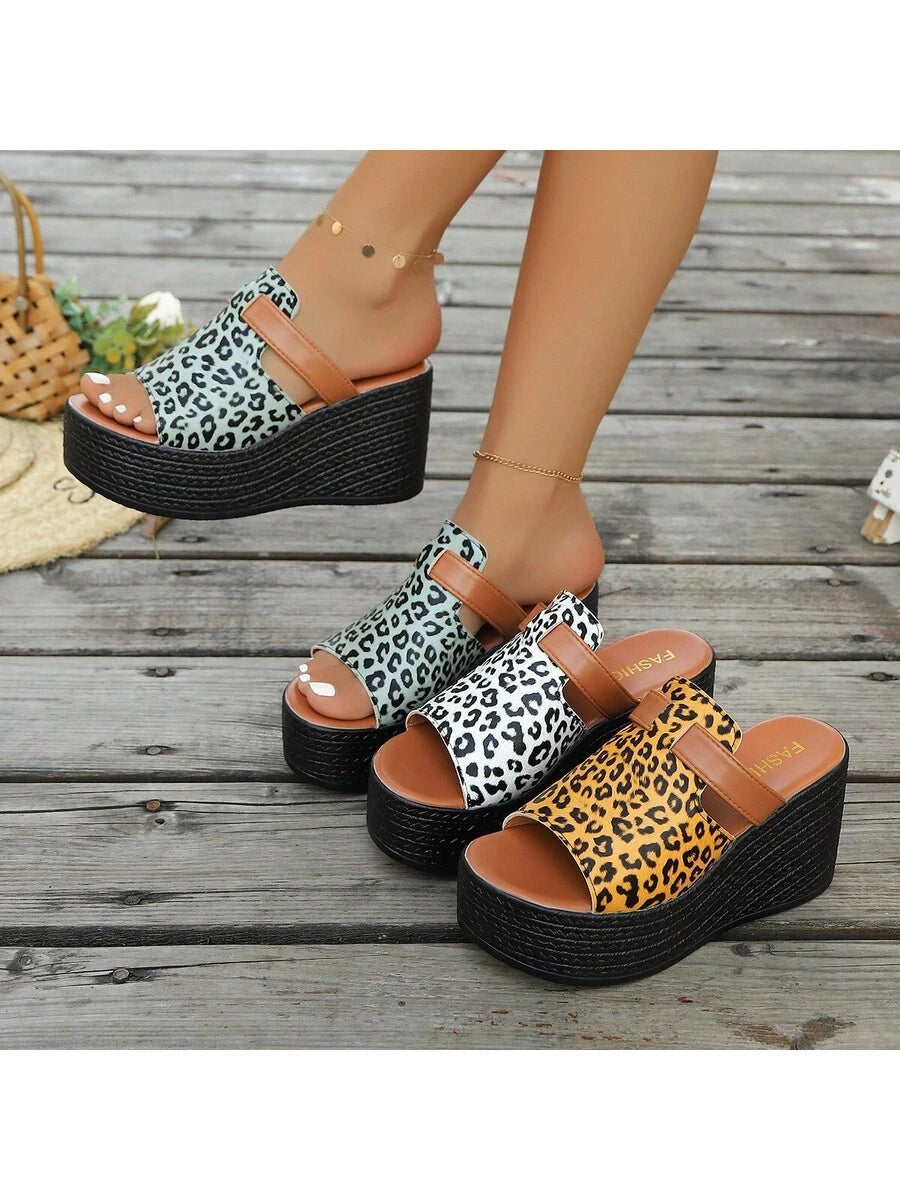 Step out in style with these Trendy Plus Size Leopard Print Wedge Sandals! Perfect for summer outings, they combine wild flair with comfy wedges to keep you both fashionable and confident. Whether you’re strolling the boardwalk or brunching with friends, these sandals add a playful touch to any outfit while supporting your every step. Embrace the season with a bold print that’s as fierce as you are!
