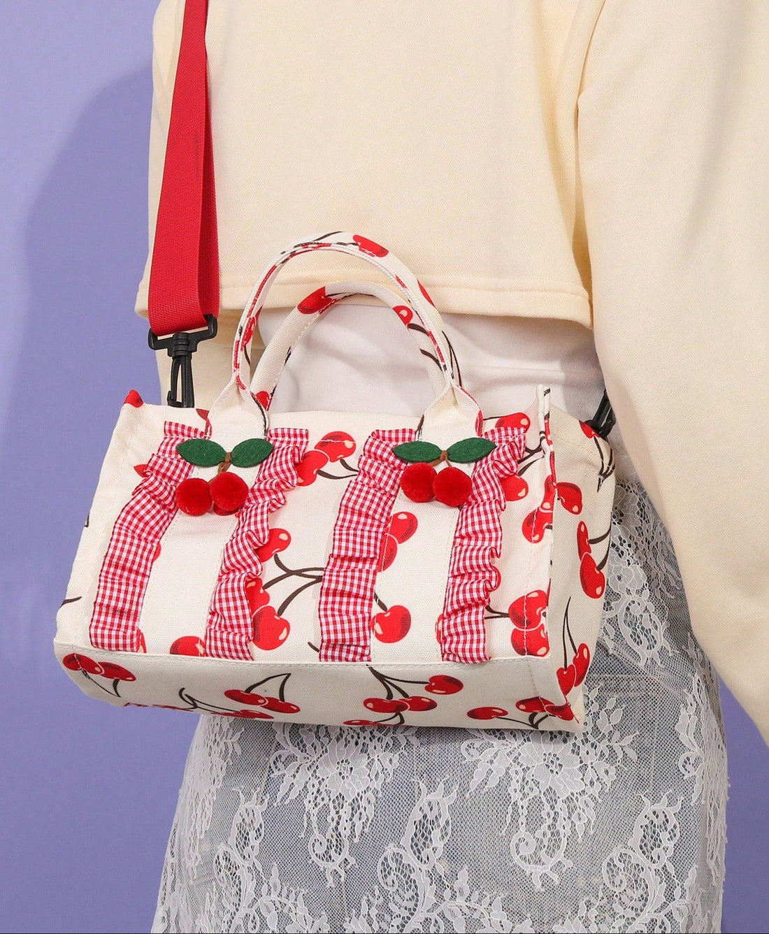 Add a splash of fun to your day with this versatile cherry print handbag! This cute mini square bag features a detachable strap, letting you switch from shoulder to crossbody in seconds. Perfect for casual outings, college classes, or lively parties, it’s the playful accessory that keeps your essentials close and your style fresh wherever you go.
