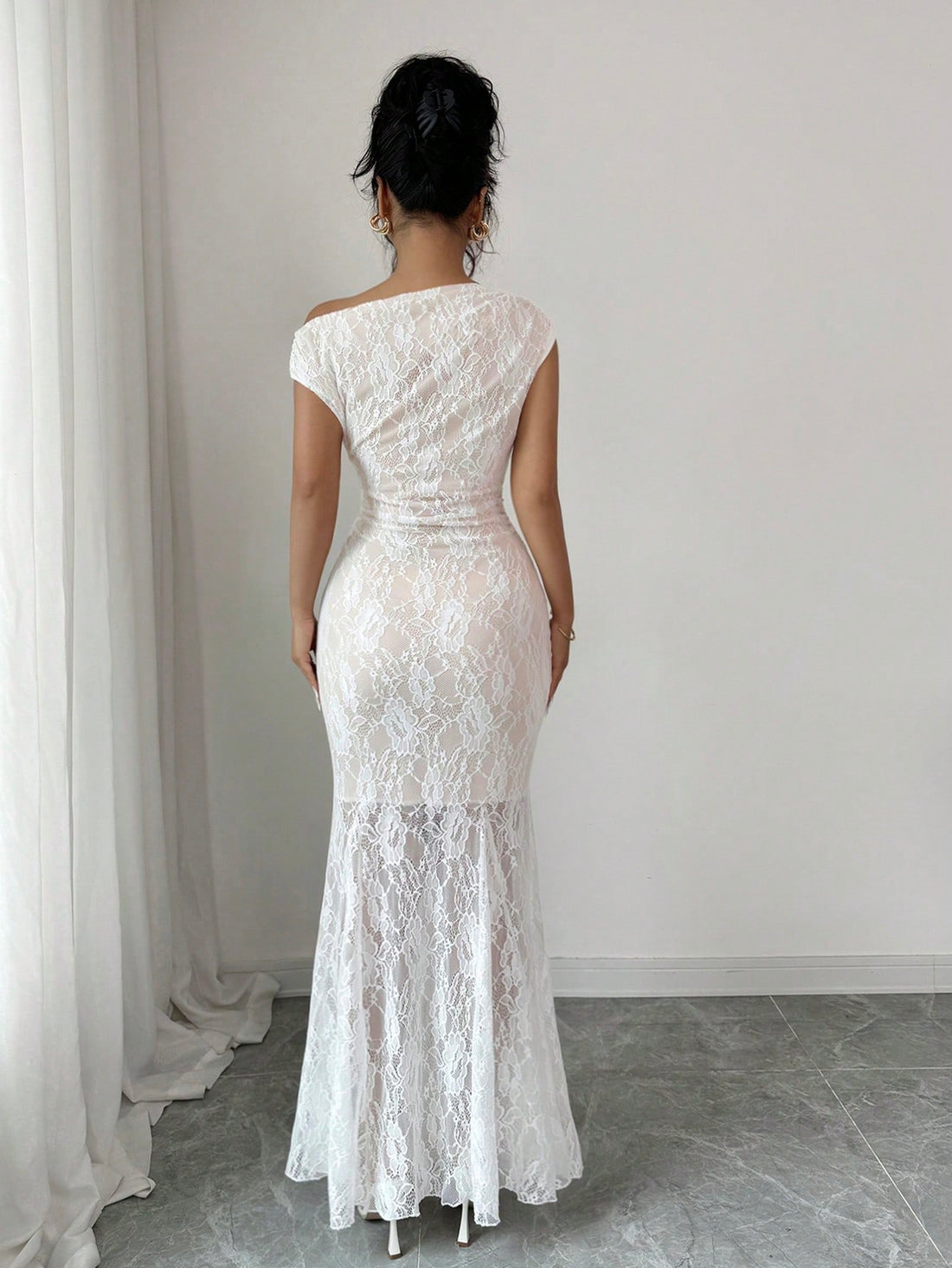 Elevate your wardrobe with this stunning white lace dress that's equal parts elegant and effortless. The chic oblique shoulder design creates a flattering, modern silhouette that works beautifully for casual outings or dreamy vacation getaways. Crafted with delicate lace detailing, this piece brings a touch of sophistication to any occasion while keeping things light and breezy. Perfect for those moments when you want to look put-together without trying too hard—because looking fabulous should always feel f