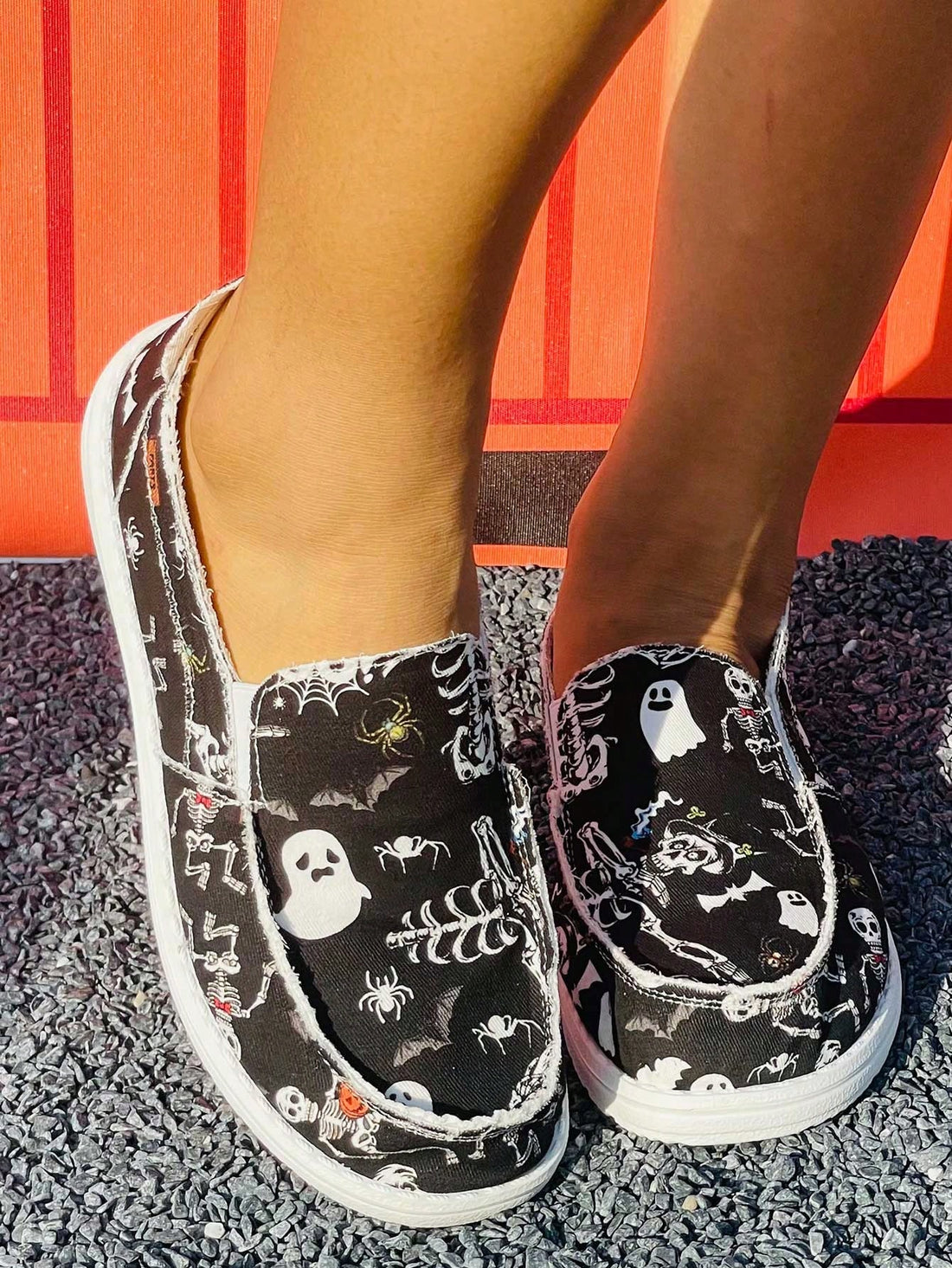 Step into the spirit of Halloween with these playful, lightweight sneakers designed just for women. Featuring a fun mix of pumpkins, skulls, and bats, these casual shoes add a spooky twist to your everyday look. Comfortable and easy to wear, they’re perfect for celebrating the season in style while keeping your feet happy all day long.