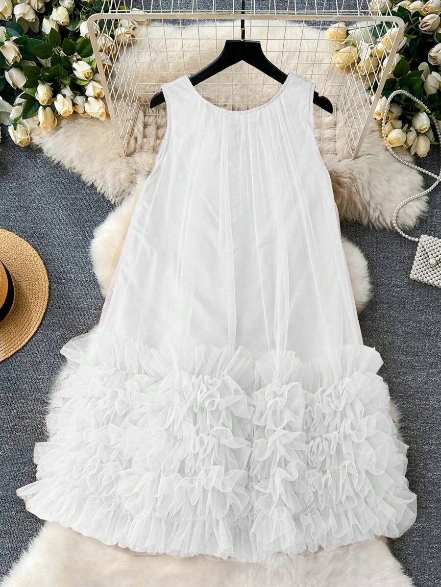 Step into spring with this Elegant Plus Size Women's Airy Mesh Flowy Beach Dress. Its lightweight mesh fabric keeps you cool and comfortable, while the flowy design adds a breezy, carefree vibe perfect for sunny outings. Whether you're strolling along the shore or enjoying a picnic, this dress combines style and ease for a playful, flattering look that celebrates your curves.