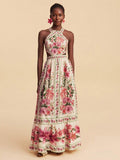 Pink floral cutout waist halter maxi dress with tiered skirt