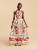 Pink tropical print halter maxi dress with open crisscross back