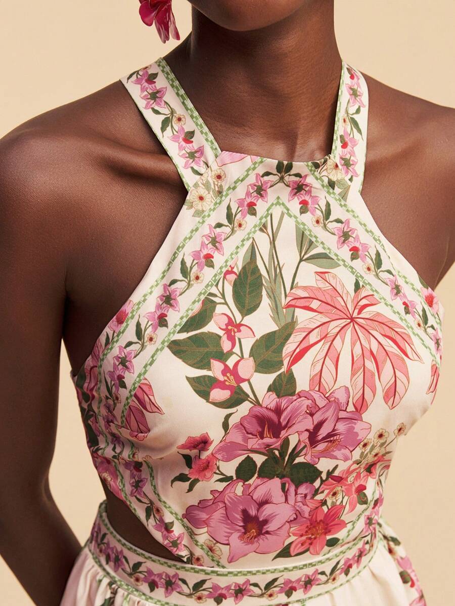 Floral halter maxi dress with cutout waist and tiered ruffle skirt