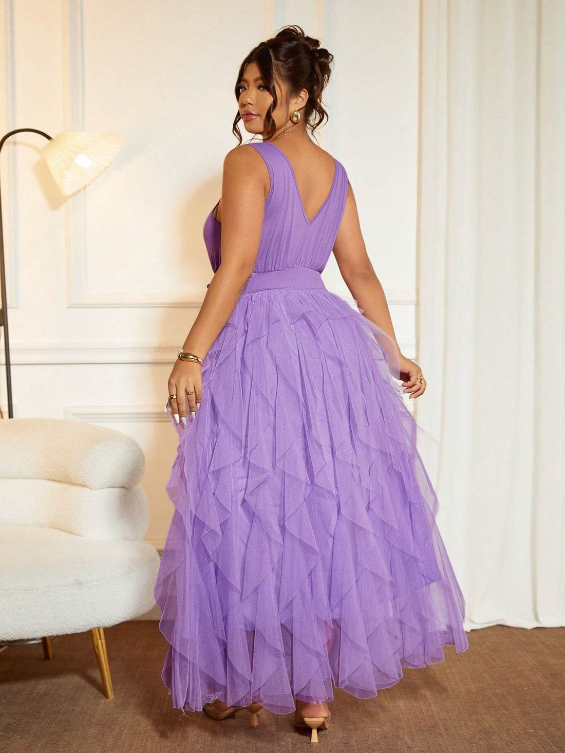 Turn heads at any celebration with this Elegant Plus Size Women’s V-Neck Sleeveless Party Dress. The playful mesh hem adds a flirty touch, while the V-neck design gracefully flatters your shape. Comfortable and stylish, it’s perfect for dancing the night away or sipping cocktails in chic confidence. Embrace your curves and make every party unforgettable!