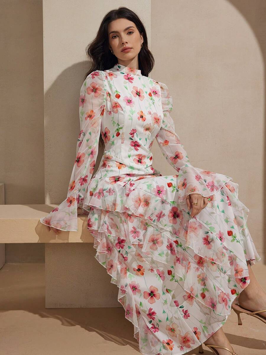 Step into summer with this Elegant Floral Print Maxi Dress! Featuring a flounced hem that catches the breeze and a tie waist that lets you flatter your figure just right, this dress combines comfort with playful charm. Whether you're strolling through a garden or headed to a brunch, its vibrant floral pattern keeps your style effortlessly fresh and fun. Perfect for warm days when you want to feel breezy, feminine, and ready for anything.