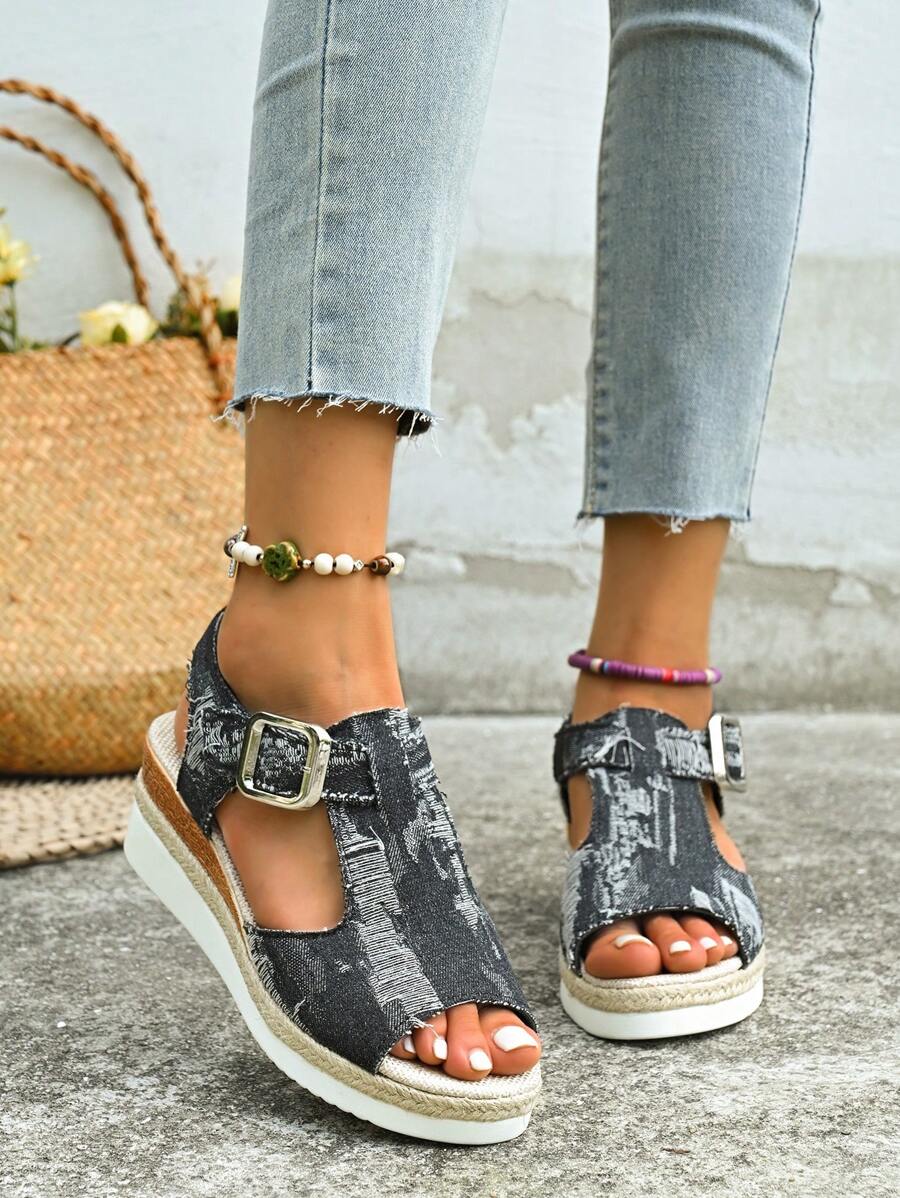 Step into summer fun with these playful black wedge sandals, featuring charming hemp rope accents that add a touch of natural flair. Perfect for daily wear or your next adventure, their comfortable wedge heel keeps you stylish and steady all day long. Embrace sunny days with a sandal that’s as lively and versatile as you are!
