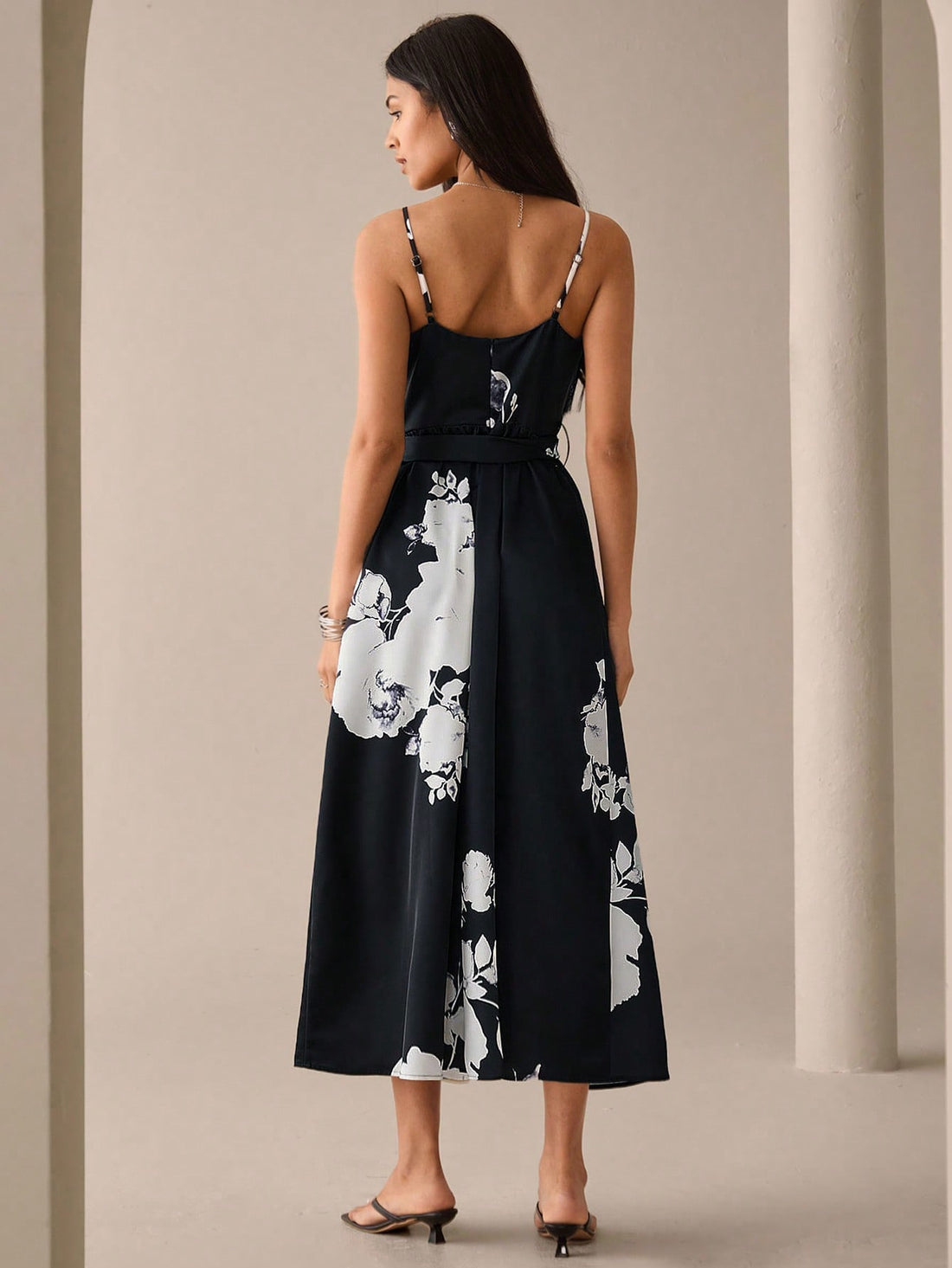 Step out in style with this Women's Floral Print Long Cami Dress, featuring a flattering self-tie waist that lets you customize your fit. Its breezy design and vibrant floral pattern bring a playful touch to your wardrobe, perfect for everything from casual brunches to city strolls. Embrace effortless elegance with a dress that’s as fun as it is chic.