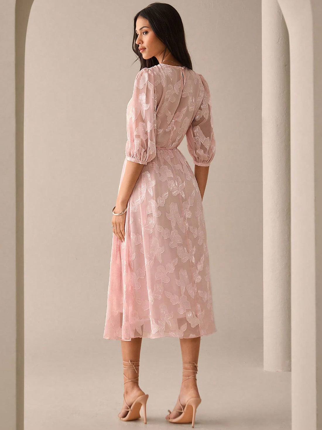 Step out in style with this Chic Pink Midi Dress featuring a playful tie knot detail. Its flattering midi length and vibrant pink hue make it ideal for sunny days and city adventures. Lightweight and breezy, it keeps you comfortable while turning heads wherever you go. Perfect for adding a splash of fun and elegance to your summer wardrobe.