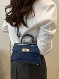 Image 8 - closure detail of Stylish Mini Polka Dot PU Leather Clutch Handbag for Fashion-Forward Looks