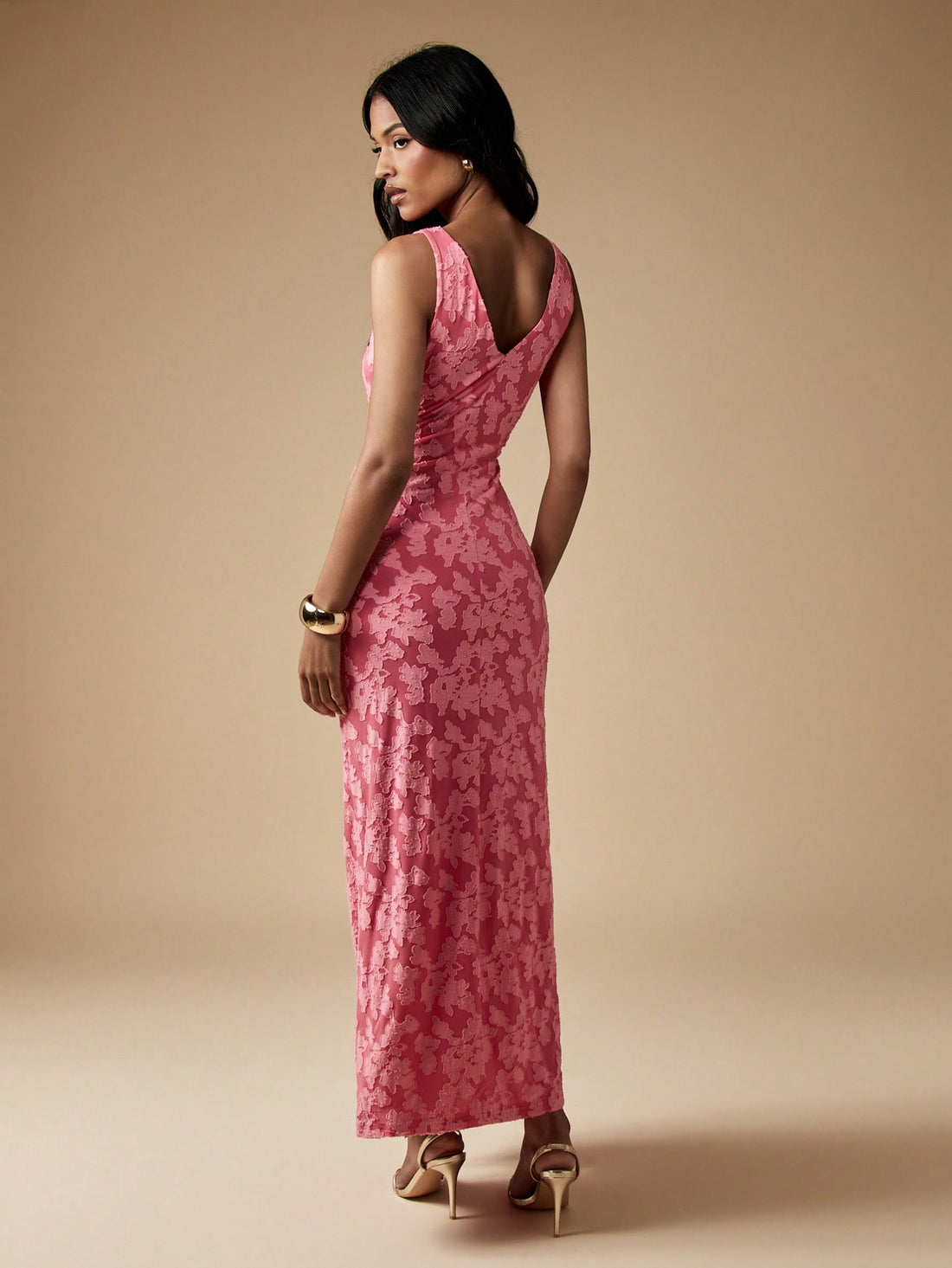 Make a statement at your next formal affair in this stunning plunge neck maxi dress. The dramatic neckline draws all eyes while strategic ruching flatters your silhouette beautifully. A delicate rose detail adds romantic flair and sophistication to the elegant design. Perfect for weddings, galas, and upscale events where you want to turn heads. This dress combines daring style with timeless elegance—because sometimes the best nights call for a little extra glamour and a whole lot of confidence.