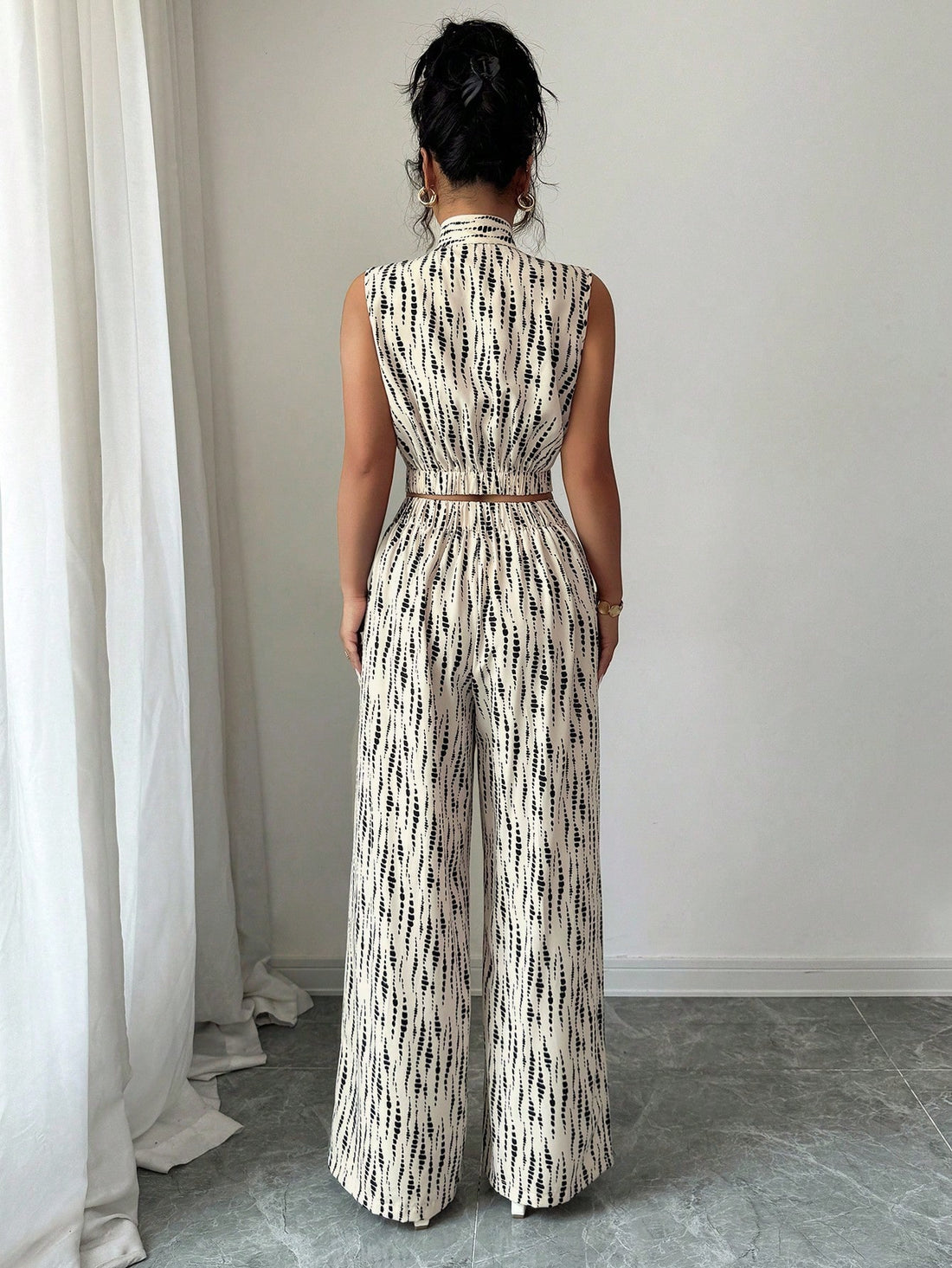 Elevate your everyday wardrobe with this charming two-piece set that effortlessly blends sophistication and comfort. The standout bowknot neckline adds a touch of feminine elegance, while the relaxed-fit pants keep you feeling at ease all day long. Perfect for casual outings, weekend brunches, or laid-back office vibes, this set proves you don't have to choose between style and comfort. Mix, match, or wear together—this versatile duo is your new go-to for looking polished without the fuss.